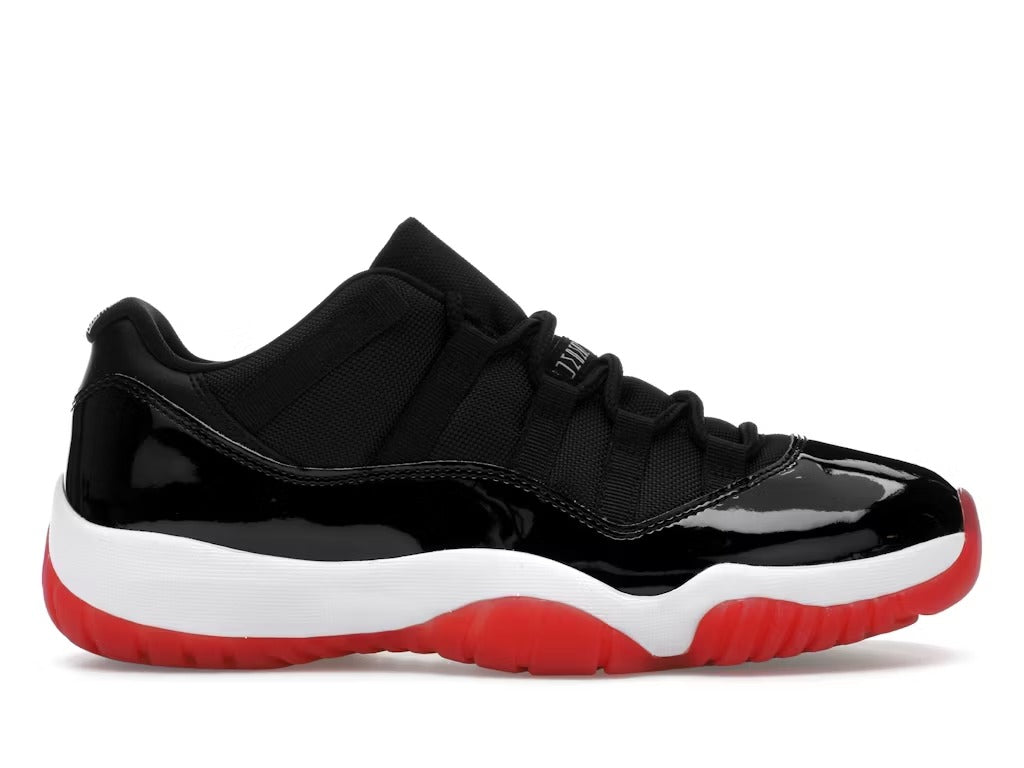 JORDAN 11 LOW NEGRO/ROJO - BRED