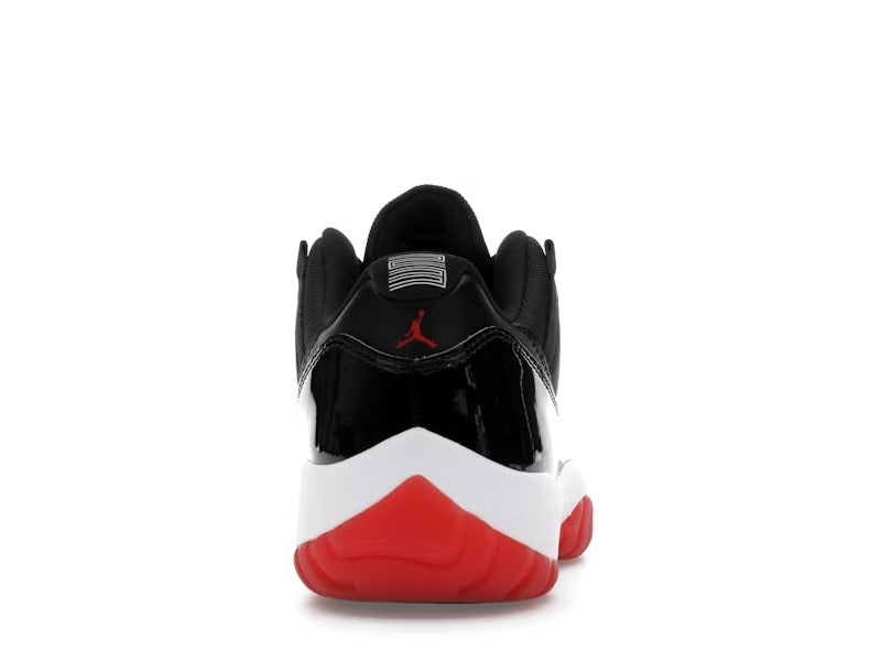 JORDAN 11 LOW NEGRO/ROJO - BRED